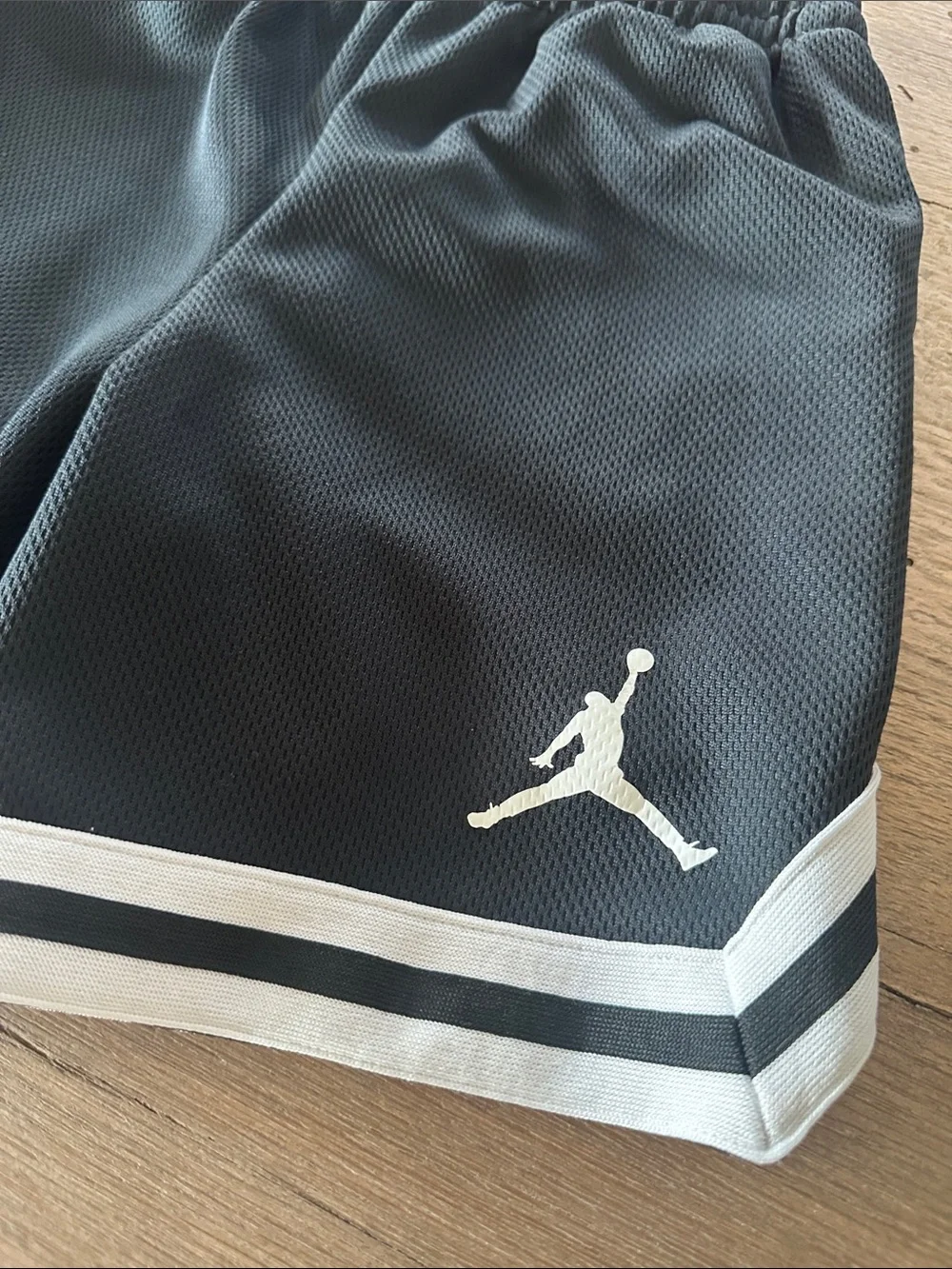 Kids Jordan Black Athletic Mesh Shorts with White Trim